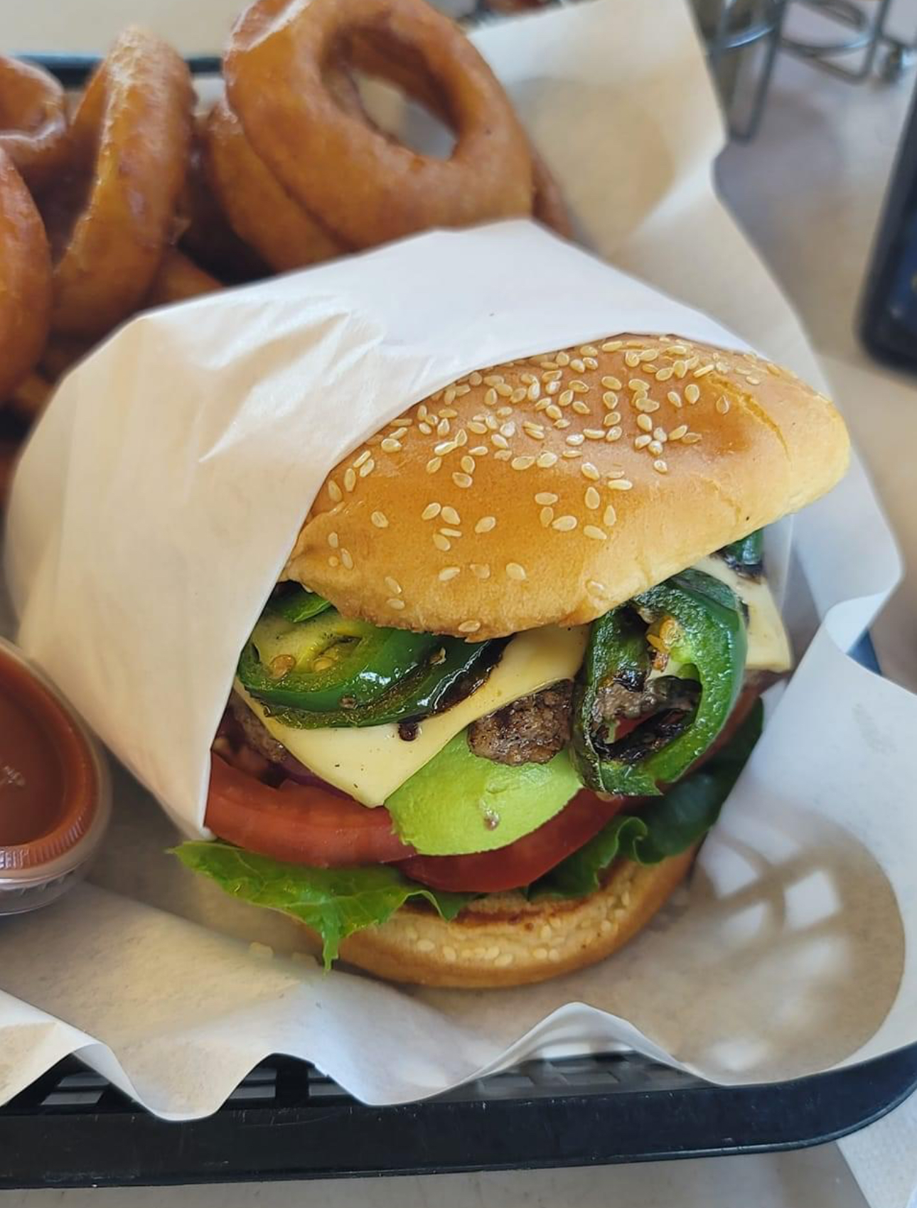 Jalapeño Avocado Burger served at Hula’s restaurant in Escalon